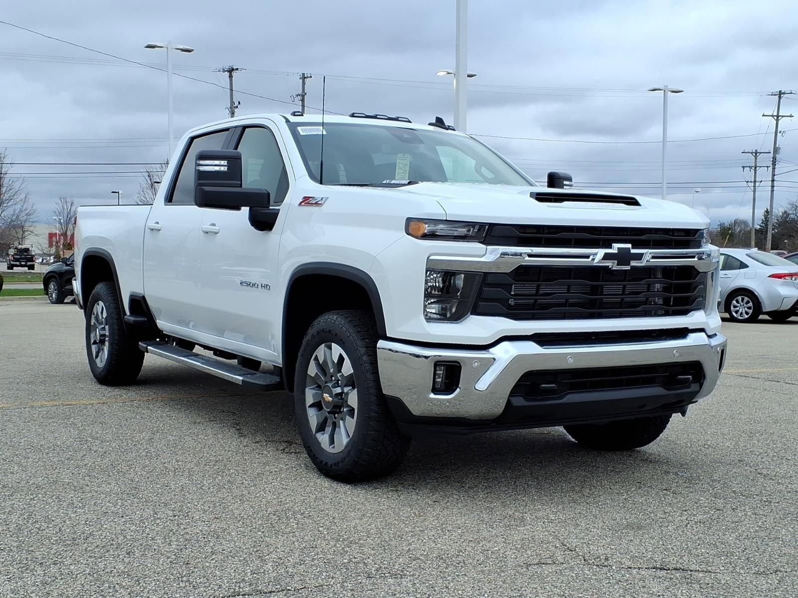 2026 Chevrolet Silverado 2500 HD LT in Summit White — front three-quarter view