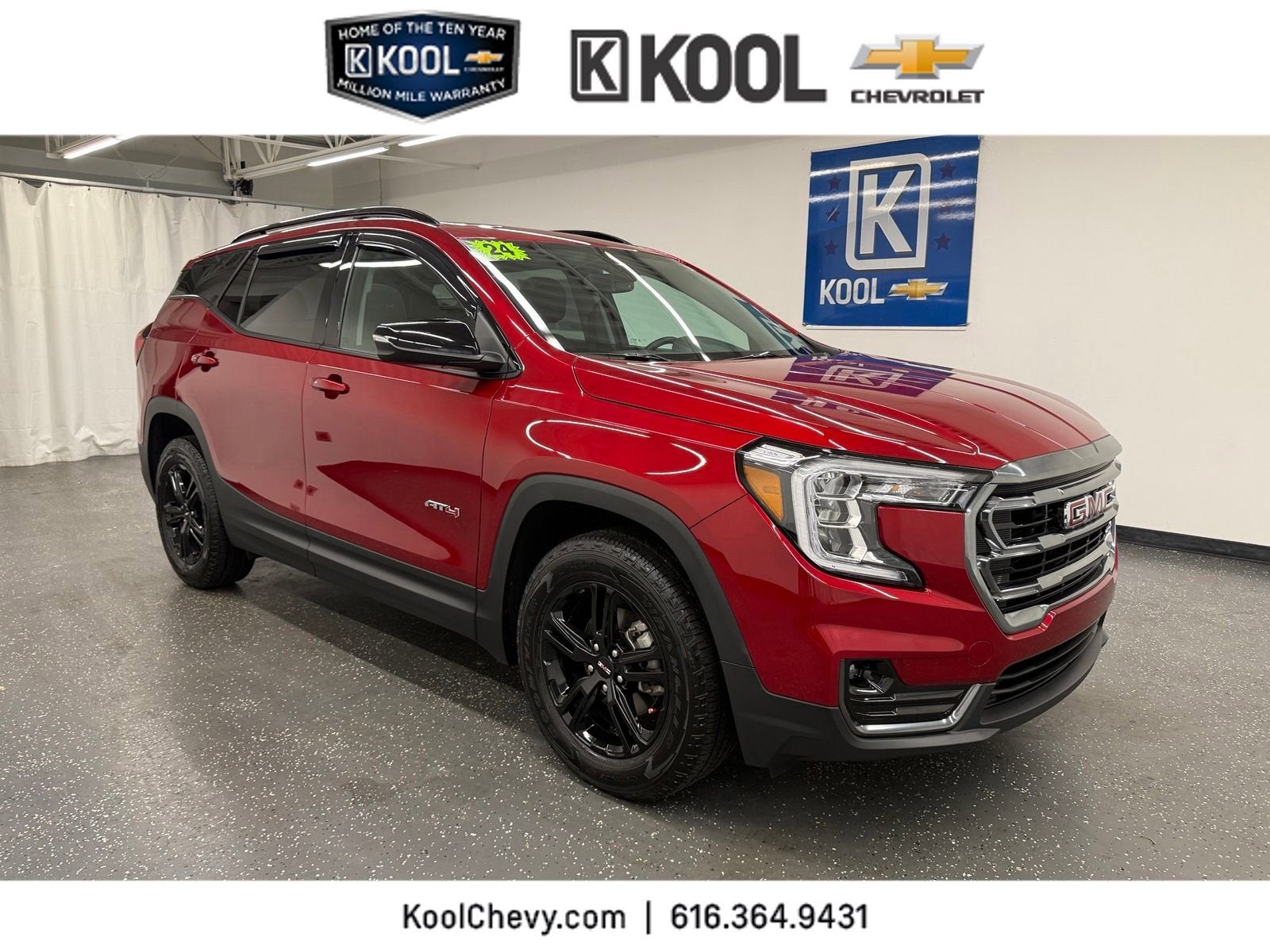 2024 GMC Terrain AT4 in Volcanic Red Tintcoat — front three-quarter view