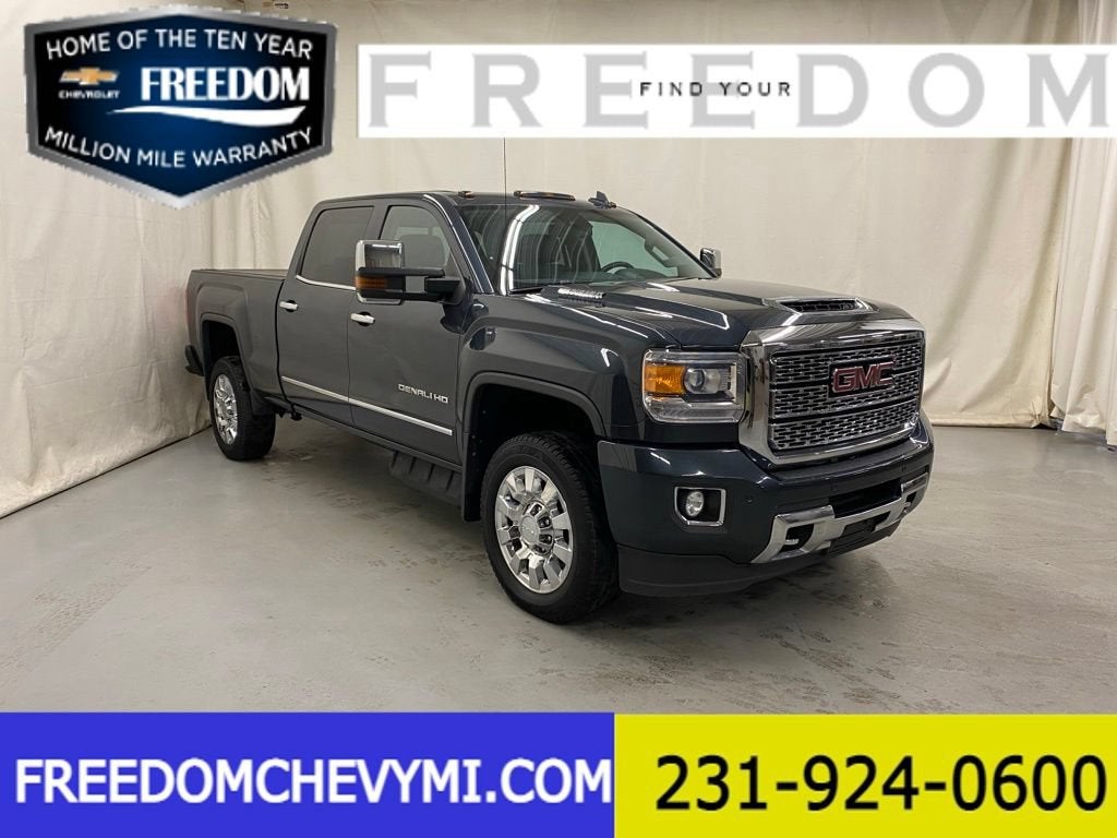 2018 GMC Sierra 2500 HD Denali in Dark Slate Metallic — front three-quarter view