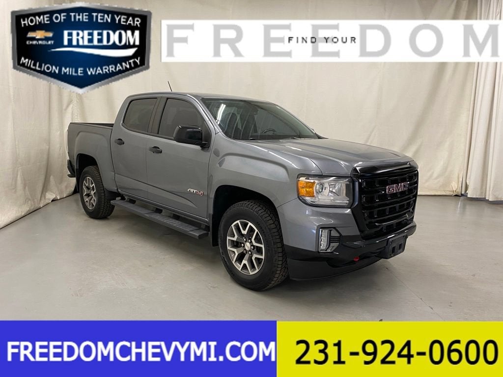 2021 GMC Canyon 4WD AT4 w/Cloth in Satin Steel Metallic — front three-quarter view