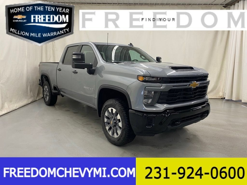 2026 Chevrolet Silverado 2500 HD Custom in Sterling Gray Metallic — front three-quarter view