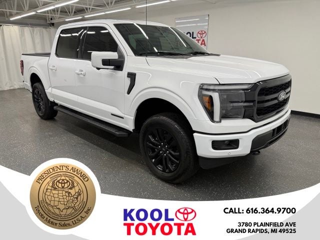 2025 Ford F-150 Lariat in Oxford White — front three-quarter view