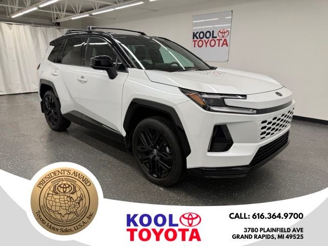 2026 Toyota RAV4 XSE in Wind Chill Pearl W/Black Roof — front three-quarter view