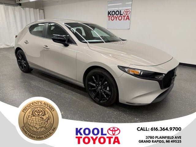 2024 Mazda Mazda3 2.5 S Select Sport in Platinum Quartz Metallic — front three-quarter view